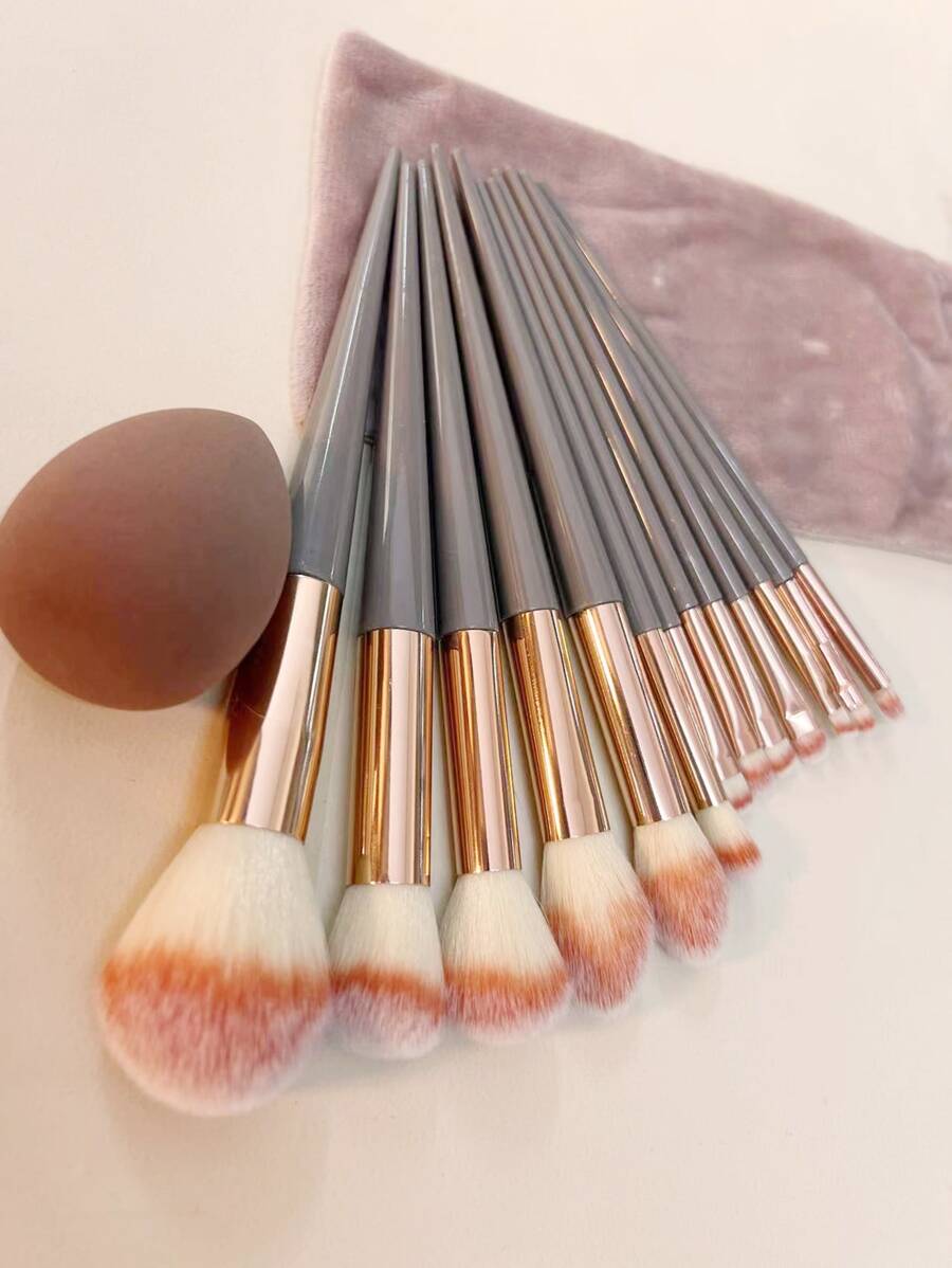 SheIn Makeup Brush Set 13 face and eye brushes and a beauty sponge in a storage bag